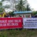Aksi Bentang Spanduk Warga Suku Balik, Tolak Penggusuran Kampung dan Sungai Sepaku